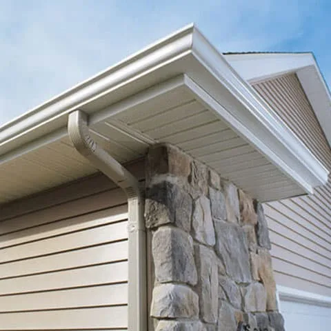 Seamless gutter run finished flush against a home's fascia