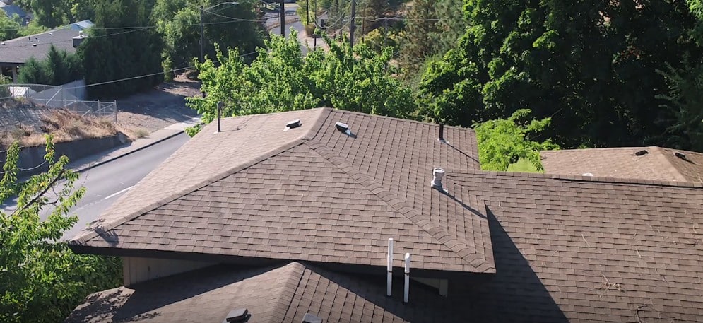 Aurora CO roofing company crew installing premium shingles
