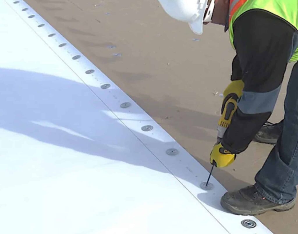 Commercial flat roof TPO membrane installation